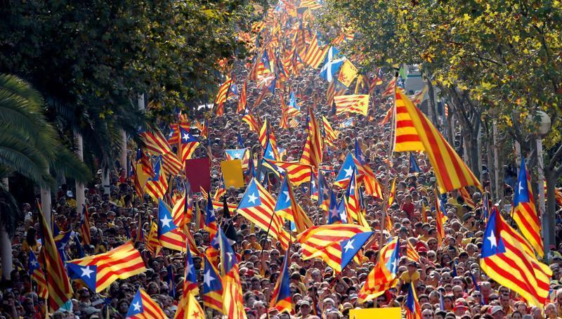 People hold  Catalan separatist flags known as 