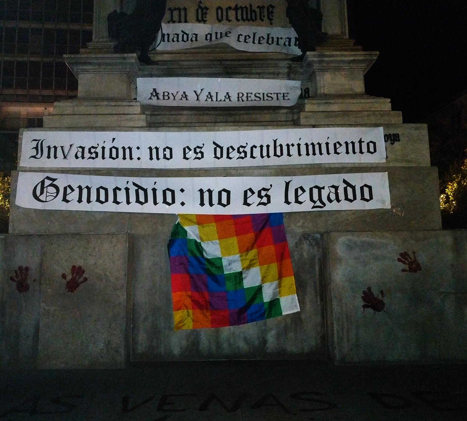 Acción de protesta durante el 12 de octubre de 2021 en Granada.